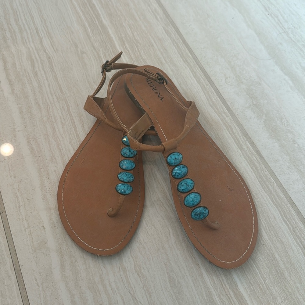 Flat turquoise and tan sandals